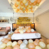 Birthday Balloon Decoration in Kolkata – Peach & White Birthday Room Decoration