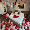 Birthday Balloon Decoration in Kolkata – Pink & Red Bedroom Surprise